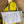 Load image into Gallery viewer, Gray leather shoulder bag with drawstring closure displayed on mannequin wearing lime green dress and colorful beaded ne - 15
