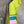 Load image into Gallery viewer, Colorblock crossbody bag in teal, green, and pink with zip pockets on lime green dress mannequin - 3
