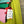 Load image into Gallery viewer, Colorblock crossbody bag in teal, green, and pink with zip pockets on lime green dress mannequin - 12
