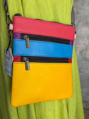 Soruka Maya recycled leather crossbody bag in colorblock yellow, blue, and red with multiple zip pockets - 1