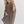 Load image into Gallery viewer, Woman wearing oversized brown ribbed knit tunic top with wide sleeves paired with leopard print wide-leg pants - 3
