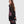 Load image into Gallery viewer, Woman wearing ET136M Fabulous Tunic Top with dark floral print, sheer black lace sleeves, and layered hem - 5
