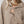 Load image into Gallery viewer, Woman wearing oversized taupe quarter-zip pullover sweatshirt with exposed seams and ribbed cuffs - 4
