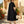Load image into Gallery viewer, Woman wearing black and cream colorblock button-down midi shirt dress with geometric pattern and short sleeves - 3
